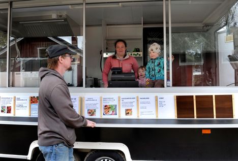 In summer, Mikko, Miia, Juho and Minka Ollila travel with a barbecue wagon at summer events selling a snack.