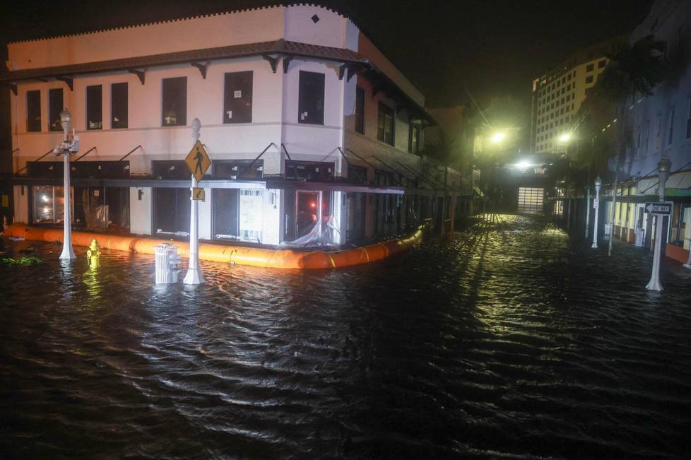 Storm surge flooded streets in Fort Myers after Hurricane Milton made landfall in Florida Thursday night.