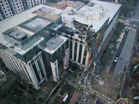 A crane collapsed on top of a building in St. Petersburg due to the force of the hurricane.