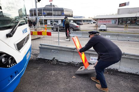 The site market must be moved to allow the bus to turn next to the tram site.