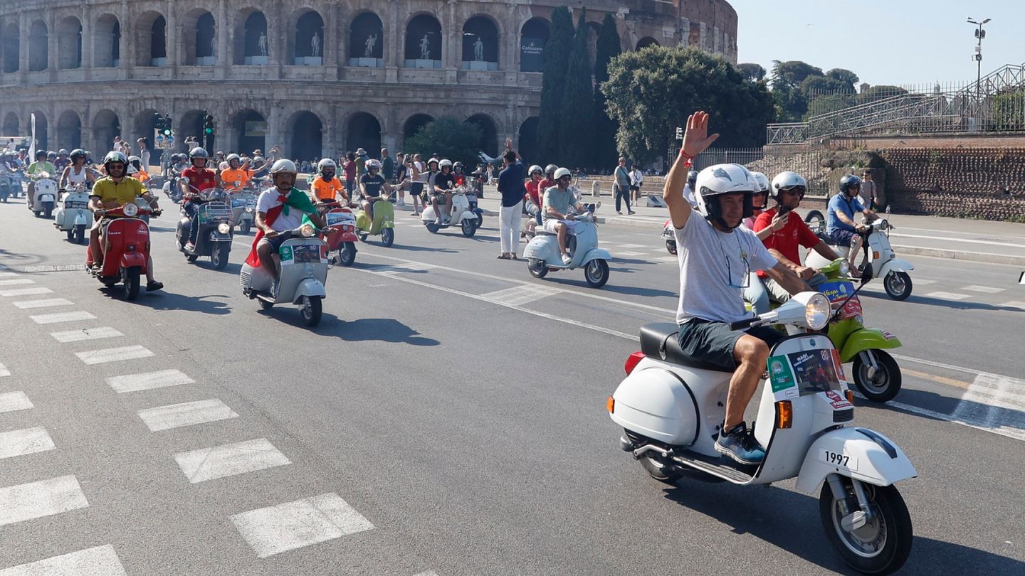 Vespa riders fill Rome's streets for 80th anniversary celebration