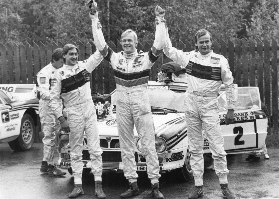 Henri Toivonen, Ari Vatanen ja Markku Alén juhlivat suomalaisten kolmoisvoittoa Jyväskylässä vuonna 1984.