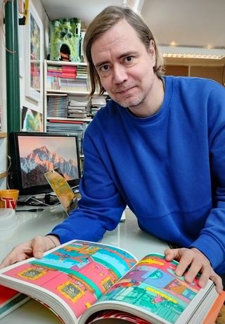 Tommi Musturi työhuoneellaan Siuron vanhalla valssimyllyllä helmikuussa 2024.
