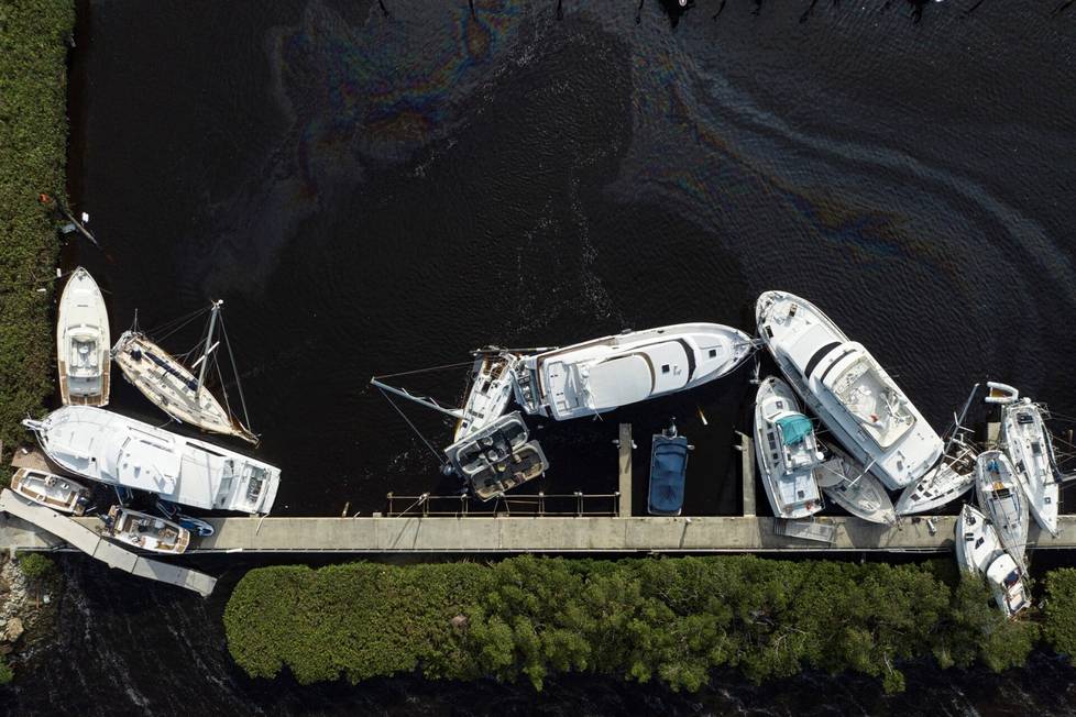 In Punta Gorda, a hurricane had washed boats ashore on Thursday.