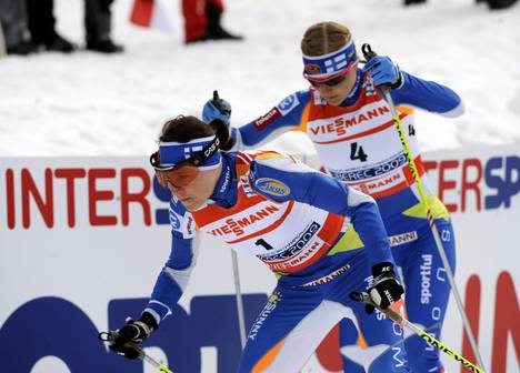 Aino-Kaisa Saarinen and Virpi Kuitunen had a fierce battle on the track for the position of the queen of the skiing world.