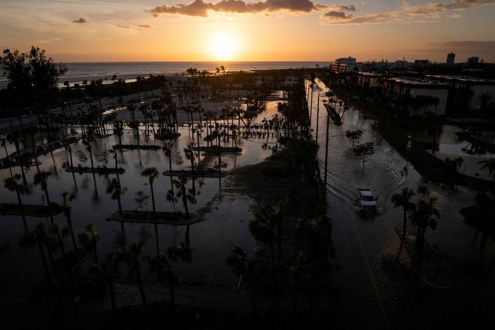 As Thursday morning dawned, the destruction of Milton could be seen. Drone footage shows a pickup truck driving through flooded streets in Siesta Key, where Milton made landfall in Florida.