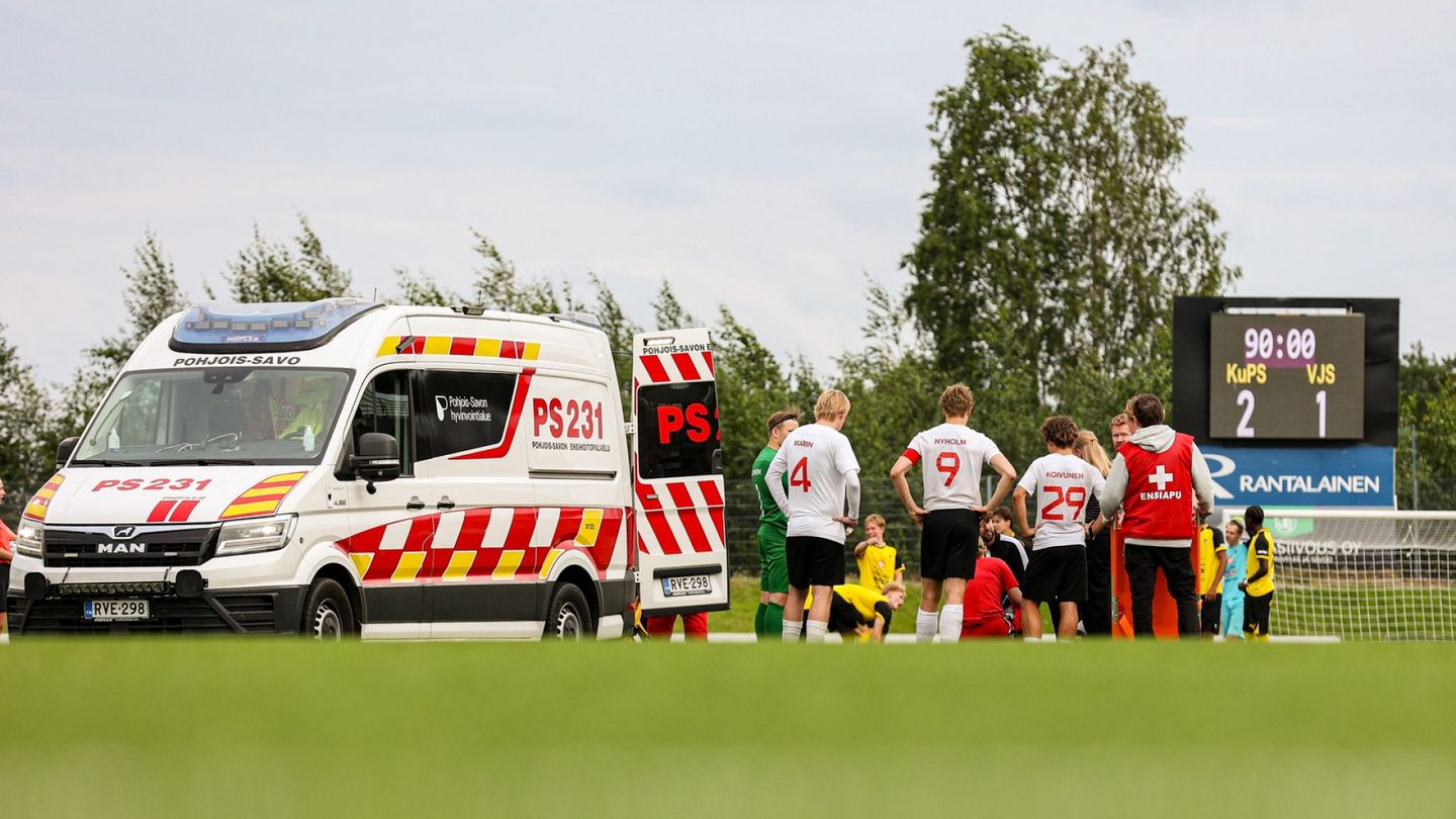 Finnish football match halted after player collapses on field